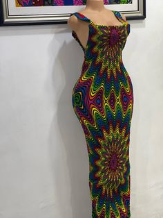 Thank you for shopping by!  Beautiful African print elasticated bodycon is extremely flattering for all beautiful body types.  made out of 100% cotton African print. The elastic thread was sewed to fabric which makes it very stretchy. length 53inches long. Spaghetti sleeves. DISCLAIMERFabric placement may vary from the Printed Stretch Bodycon Dress, Fitted Patterned Cotton Dress, Casual Fitted Dress With Bold Print, Colorful Pattern Fitted Sleeveless Maxi Dress, Multicolor Stretch Maxi Dress, Trendy Stretch Printed Dresses, Stretch Summer Dresses With Vibrant Print, Multicolor Bodycon Maxi Dress, Fitted Maxi Dress With Bold Print For Summer