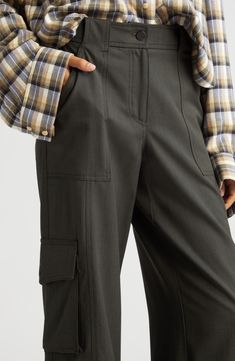 Cargo pants are on the comeback trail, and this stretchy wool pair is a polished way to take on the trend. 31 1/2" inseam; 25" leg opening; 11" front rise; 15 1/2" back rise (size 8) 97% wool, 3% elastane Dry clean Made in the USA Fall Workwear Full-length Cargo Pants, Fitted Bottoms With Cargo Pockets For Workwear, Classic Fitted Pants With Cargo Pockets, Fitted Cargo Pants With Welt Pockets For Work, Fitted Wide Leg Cargo Pants For Workwear, Seam Detailed Pants For Workwear, Fall Wool Ankle-length Pants, Fall Full-length Cargo Pants With Welt Pockets, Fitted Pants With Side Pockets For Fall