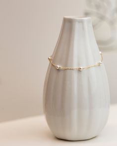 Perfect for everyday and layering!Simple and delicate bracelet - Perfect for Stacking & Layering or even alone.Featuring Swarovski pearl stations with dainty Gold Fill or Sterling Silver chain. Perfect bridesmaids gift or for bridal jewelry. • Pearl measures approx. 4mm• 1" Adjustable chain• Sterling silver or Gold filled• Swarovski pearls• Perfect gift for Bridesmaids and Bride Minimalist Sterling Silver Pearl Chain Bracelet, Dainty Sterling Silver Bracelets With Pearl Charm, Dainty Silver Bracelet With Pearl Chain, Minimalist Silver Pearl Bracelet With Adjustable Chain, Everyday Silver Bracelets With Pearl Chain, Dainty Sterling Silver Pearl Bracelet With Charm, Silver Pearl Chain Bracelet As Gift, Everyday Delicate Sterling Silver Pearl Bracelet, Minimalist Sterling Silver Pearl Bracelet For Wedding