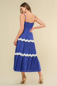 A solid woven midi dress featuring straight neckline, straps, tiered skirt with lace on top and back zipper closure Details: Self : 38% Rayon 24% Nylon 38% PolyesterLining : 100% Polyester Size & Fit - Model is 5`9" And Wearing Size Small- Measurements Taken From Size Small- Approx. Length: 45" Spring Blue Tiered Dress With Ruffled Straps, Blue Midi Dress With Adjustable Straps For Brunch, Casual Blue Midi Tiered Dress, Casual Blue Midi Length Tiered Dress, Blue Tiered Summer Midi Dress, Blue Midi Tiered Dress For Beach, Blue Midi Dress With Adjustable Straps, Blue Midi-length Tiered Dress For Beach, Blue Tiered Midi Dress For Day Out