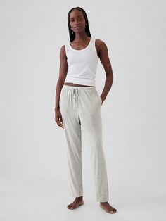 Soft, stretch modal-blend pajama joggers.  Elasticized waist with drawcords.  Front slant pockets.  * Fit: Classic.  An easy silhouette that fits close  at the waist, and is relaxed through the hips and thigh.  Models wearing Gap Pajama Joggers, Easy Silhouette, Brand Collaboration, Women's Pajamas, Tops And Bottoms, Nightgowns, Pj Sets, Pajama Sets, Fall 2024