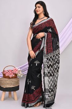 Discover timeless elegance with our Handblock Printed Linen by Cotton Saree, a masterpiece that blends tradition with modern sophistication. Crafted meticulously by skilled artisans, each saree tells a story of craftsmanship and heritage. Made from high-quality linen and cotton blend, this saree promises comfort along with a luxurious feel. The handblock printing technique used ensures that each motif is unique and exquisitely detailed, making it a wearable piece of art. Whether you wear it for Black Block Print Blouse Piece For Diwali, Black Block Print Saree With Traditional Drape, Black Cotton Silk Pre-draped Saree With Cutdana, Unstitched Black Saree With Block Print, Black Blouse Piece With Block Print For Diwali, Elegant Block Print Traditional Festive Wear, Elegant Block Print Traditional Wear For Festive Occasions, Black Saree With Block Print And Traditional Drape, Diwali Black Blouse Piece With Block Print