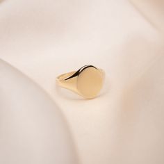 14k Gold Signet Ring Handcrafted and built to last a lifetime and more. Material: 14k Solid Gold Available in 14k Yellow Gold, 14k White Gold or 14k Rose Gold. Face dimension: 10.5 x 9mm Made to order, please allow 1 - 2 weeks for processing. Learn about the history of the signet ring on our blog. 14k Gold Signet Ring, Gold Face, Special Ring, Gold Signet Ring, Gifts For My Wife, Lovely Ring, Unique Ring, Signet Ring, Custom Engraving