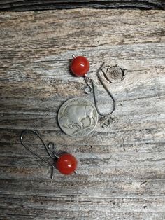 Choose your ear wire to go with these colorful Red Carnelian Bead dangles. The ear wires are available in sterling silver or two types of hypoallergenic wires. In the third picture the ear wires are starting on the left: sterling silver, niobium, titanium and oxidized titanium (I love the color of this last pair!). The red carnelian bead dangles are 10 mm across. They are hand wire wrapped with sterling silver. Made to order and ready to ship in 1-3 days. Carnelian Drop Earrings As Gift, Carnelian Drop Earrings For Gift, Carnelian Drop Earrings Jewelry Gift, Carnelian Dangle Jewelry With Matching Earrings, Adjustable Nickel Free Carnelian Jewelry, Carnelian Dangle Jewelry For Pierced Ears, Red Carnelian Earrings Perfect As A Gift, Carnelian Amber Earrings For Gift, Carnelian Teardrop Earrings For Gift