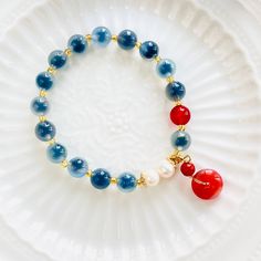 Blue Beaded Bracelet With Pearl Charm As Gift, Blue Beaded Bracelet With Pearl Charm For Gift, Blue Pearl Bracelet With Natural Stones, Blue Pearl Bracelet With Natural Round Beads, Blue Carnelian Jewelry As A Gift, Blue Pearl Bracelet With Gemstone Beads As A Gift, Blue Carnelian Jewelry For Gift, Blue Carnelian Jewelry For Gifting, Blue Agate Bracelet As Gift