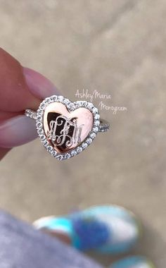 Our customized Rose Gold Royce ring is one of a kind and designed by the owner, AshleyMaria. This ring is 925 Sterling Silver with a top coat of Rhodium. Inside of the heart ring is Rose Gold. Our rings run true to US sizes. Silver Monogram Diamond Rings, White Monogram Initial Ring For Anniversary, Monogrammed White Initial Ring For Anniversary, Silver Monogram Ring For Wedding, Silver Diamond Ring With Monogram, Personalized Initial Ring In White For Anniversary, White Monogram Ring For Anniversary, Silver Initial Ring With Vvs Clarity For Anniversary, Monogrammed White Gold Rings For Wedding