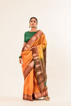 Discover the elegance of our Mustard Yellow Kanjeevaram Silk Saree, featuring intricate Mayil butas in pure gold Zari. This handwoven masterpiece comes with a green and gold border, adorned with Zari detailing. Ceremonial Tissue Silk Traditional Wear With Zari Weaving, Green Saree With Cutdana In Temple Jewelry Style, Ceremonial Gold Tussar Silk Traditional Wear, Ceremonial Green Paithani Silk Saree, Ceremonial Gold Banarasi Silk Saree, Gold Silk Traditional Wear With Cutdana, Ceremonial Green Traditional Wear With Zari Weaving, Gold Paithani Silk Traditional Wear For Ceremonies, Ceremonial Gold Paithani Silk Dupatta