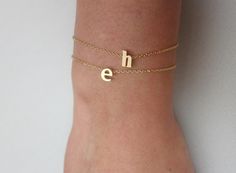 tiny gold letter bracelet Dainty Gold Charm Bracelet As Gift, Trendy Yellow Gold Charm Bracelet Gift, Trendy Hypoallergenic Gold Bracelet As A Gift, Simple Adjustable Gold Bracelet For Gifts, Gold Hypoallergenic Bracelets As Gift, Simple Yellow Gold Bracelet As Gift, Simple Yellow Gold Bracelet For Gift, Simple Yellow Gold Bracelet Gift, Gold Hypoallergenic Bracelets For Gifts