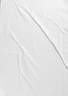 an empty sheet of white paper on a black background