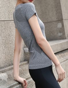 Stretchy, soft sport workout top. Large fits as a medium 92% Nylon, 8% Spandex Fitted Athleisure T-shirt For Training, High Stretch Athleisure T-shirt For Workout, Fitted Breathable T-shirt For Athleisure, Breathable Fitted T-shirt For Workout, Breathable Stretch Casual T-shirt, Sporty Athletic Fit T-shirt For Light Exercise, Gray Moisture-wicking Short Sleeve Activewear, Gray Short Sleeve Athletic Activewear, Gray Short Sleeve Tops For Light Exercise