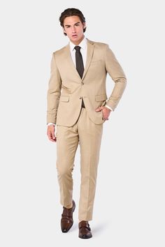 This tan suit is crafted with a classic notch lapel collar and two-button jacket closure and paired with un-hemmed trousers. Tailored from our fine poly/rayon blend, this stylish yet comfortable suit comes in a modern or slim fit of your choice. Beige Single-breasted Suit With Notch Lapel, Tan Suit, Button Jacket, Jacket Buttons, Tie Shoes, Lapel Collar, Suit Jacket, Trousers, Slim Fit