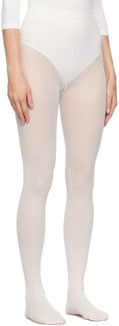 Rib knit stretch nylon- and cotton-blend tights in white. · 70 denier · Knit elasticized waistband · Partial jersey lining Supplier color: Ecrue Thirty Two, White Tights, Apparel Accessories, Rib Knit, Tights, Dress Up, Cotton Blend, Outfit Accessories, Knitting