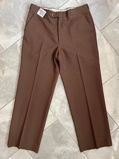 "Vintage dad-pant trousers made by Boulevard Club. Lovely neutral brown colour. 100% wool. Tag does not indicate size, measures 16\" across waist, 20\" hips, 11\" rise, 28\" inseam, 9.5\" leg opening." Fitted Brown Business Bottoms, Fitted Brown Bottoms For Business, Brown Work Pants With Welt Pockets For Business Casual, Business Casual Brown Work Pants With Welt Pockets, Brown Dress Pants For Business Casual In Fall, Brown Dress Pants For Business Casual Fall Season, Semi-formal Brown Bottoms For Fall, Fall Season Brown Business Casual Dress Pants, Brown Bottoms For Semi-formal Fall Occasions