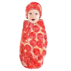 a baby dressed in a pepperoni costume