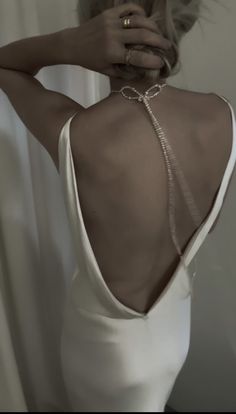 Not your grandma’s pearl necklace— asymmetrical strands of freshwater pearls are knotted into a choker for a dramatic yet iconic vintage moment. — See below for additional details // Elegant Beaded Choker For Evening, Elegant Beaded Choker For Formal Occasions, Elegant Pearl Choker With Clavicle Chain, Elegant Formal Beaded Choker, Chic Pearl Choker For Wedding, Chic Pearl Choker Necklace For Wedding, Timeless Single Strand Pearl Necklace For Wedding, Wedding Pearl Choker With Clavicle Chain, Elegant Wedding Choker With Clavicle Chain