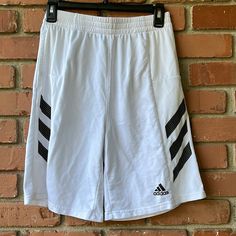 White Polyester Shorts. Never Worn! White Shorts With Three Stripes For Spring, White Three Stripes Shorts For Spring, White Athletic Shorts With Three Stripes For Summer, Adidas Sporty White Athletic Shorts, Adidas Casual White Shorts, White Casual Athletic Shorts With Pockets, Casual White Athletic Shorts With Pockets, Adidas White Bottoms With Elastic Waistband, White Adidas Bottoms For Summer