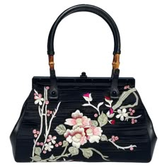 Tom Ford For Gucci Black Silk Frame Japanese Flowers Bag S/S 2003 Collection, Rare And Collectible. N 112528 204990 Colors – Black; Silk, Leather, Bamboo. Floral Japanese Embroidery In White, Pink, Red, Green On Both Sides Leather Side Panes, Frame-shaped Opening, Signature Bamboo Handles. Matte Black Hardware, Brown Leather Interior, One Zip Pocket. 14” Width X 10.5” Height X 4.5” Depth Made in Italy. Excellent condition. Elegant Black Shoulder Bag With Bamboo Handle, Formal Black Shoulder Bag With Bamboo Handle, Rare Bags, Tom Ford For Gucci, Tom Ford Gucci, Tom Ford Bag, Japanese Bag, Gucci Brand, Matte Black Hardware