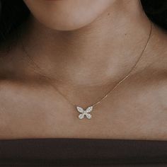 Get ready to make hearts flutter when you rock this stunning Mirabella Diamond Butterfly Necklace in 18K white or yellow gold! Pair it with anything from our Butterflies Collection for an all-over charming look. Natural Diamonds: 0.45ctw 18K White or Yellow Gold Length: 16 Inches White Butterfly Necklace In Fine Jewelry Style, Fine Jewelry Diamond Butterfly Necklace In Yellow Gold, Yellow Gold Diamond Butterfly Necklace, Diamond Butterfly Necklace In Yellow Gold, Yellow Gold Diamond Necklace With Butterfly Charm, Elegant White Diamond Butterfly Necklace, Elegant White Butterfly Necklace In Cubic Zirconia, Elegant White Gold Butterfly Necklace With Diamonds, Elegant White Gold Diamond Butterfly Necklace