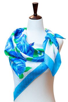 Made in ITALY Made from a luxuriously soft 100% silk twill, this scarf is sure to elevate any outfit into your own glamorous style. This luxurious scarf is a great gift for someone special or for your own wardrobe. The striking combination of blue and green is eye-catching and makes the perfect finishing touch to any special outfit. Dry Cleaning is how to best care for your silk scarf. This beautiful piece of art is approx 35 x 35 inches. The silk is spun, woven, printed, and finished in Brianza Rose Scarf, Green Roses, Glamorous Style, Green Rose, Silk Twill, Blue And Green, Silk Scarf, Pure Silk, Piece Of Art