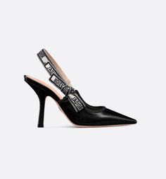 The J'Adior slingback pump is a prime example of Dior's savoir-faire. Crafted with passion in Christian Dior's Italian ateliers, the silhouette is distinguished by black calfskin. The J'Adior two-tone embroidered ribbon is embellished with a flat bow, and a 10-cm (4) comma heel offers an elegant and refined finishing touch.. Heels And Bags, Dior Heels, Ballerinas Shoes, Dior Jadore, Dior Star, Embroidered Ribbon, Silver Pumps, Gold Pumps, Designer Pumps