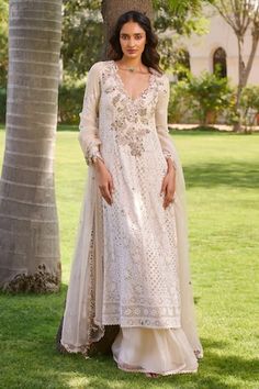 Ivory kalidar featuring floral paisley chikankari embroidered base, highlighted by zardozi, mukaish work, embellished by pearls and jewels. Comes with sharara and dupatta. - Aza Fashions Kalidaar Kurta, Organza Sharara, Kurta And Sharara Set, Kurta And Sharara, Tuxedo Accessories, Beach Wedding Guests, Chikankari Suits, Luxury Pret, Summer Bride