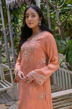 Peach kurta with zardozi, bead, sequin embroidery in floral pattern. Paired with dhoti pant. - Aza Fashions Eid Gota Work Churidar, Bollywood Churidar With Cutdana, Diwali Gota Work Churidar, Designer Kurta With Cutdana For Diwali, Designer Cutdana Kurta For Diwali, Designer Diwali Kurta With Cutdana, Unstitched Palazzo Set With Cutdana For Diwali, Navratri Chinon Kurta With Cutdana, Designer Slub Silk Sets For Diwali