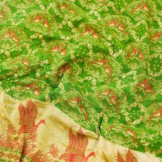 Elevate your style with our Pure Georgette Silk Meenakari Banarasi Bandhani Saree. This luxurious Banarasi saree showcases an intricate Meenakari peacock, adding timeless charm and regality to your ensemble. Celebrate Banaras' artistry and heritage. Can be dyed in any color of your choice. Festivals Brocade Pre-draped Saree With Pallu, Green Semi-stitched Pre-draped Saree With Meenakari, Green Bollywood Pre-draped Saree With Meenakari, Chanderi Meenakari Pre-draped Saree For Navratri, Brocade Anarkali Pre-draped Saree With Cutdana, Brocade Pre-draped Saree With Traditional Patterns, Traditional Pre-draped Saree With Meenakari For Ceremonies, Bollywood Style Jamawar Pre-draped Saree For Diwali, Brocade Saree For Ceremonial Use During Diwali