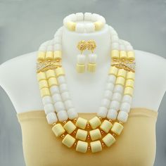 This is for high quality  handmade Nigerian wedding jewelry , it takes 3-5 days for the production Fine Jewelry Crystal Jewelry Sets In White, Fine Jewelry White Crystal Jewelry Sets, White Crystal Jewelry Sets For Gift, White Crystal Jewelry Sets As Gift, White Crystal Fine Jewelry Sets, Traditional White Jewelry For Marriage, Elegant Crystal Jewelry For Wedding, White Crystal Bridal Sets With Elegant Design, Traditional White Jewelry With Elegant Design