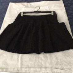 Never Worn, Fun Skirt! Sz 36 Translates To Us Small Pleated Stretch Full Skort, Casual Black Flared Tennis Skirt, Casual Stretch Full Skirt Pleated Skirt, Casual Stretch Full Pleated Skirt, Casual Stretch Pleated Full Skirt, Casual Fitted Full Mini Skirt, Casual Black Tennis Skirt For Night Out, Casual Black Full Pleated Skirt, Black Fitted Tennis Skirt With Pockets