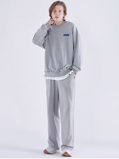 Editor's NotesA comfortable sweatshirt and sweatpants set made with cotton and polyester. This set has a smooth look and feel. It is easy to layer and even easier to love.- Oversized fit- Embroidery details- Sweatshirt: Drop shoulders - Sweatshirt: Ribbed hem and cuffs - Pants: Elastic waistband- Pants: Adjustable hem with stringMeasurements(in.)M/L/XL/XXL- Shoulder: 22.82/23.62/25.59/26.38in.- Chest: 21.26/22.83/25.2/26.77in.- Sleeve length: 20.08/21.26/22.05/22.83in.- Total length: 24.02/26.38 Crew Neck Tracksuit For Loungewear, Cotton Tracksuit With Elastic Cuffs Long Sleeve, Relaxed Fit Crew Neck Tracksuit For Streetwear, Sporty Cotton Crew Neck Tracksuit, Relaxed Fit Athleisure Tracksuit With Letter Print, Casual Tracksuit With Elastic Cuffs And Long Sleeves, Casual Tracksuit With Elastic Cuffs, Fleece Tracksuit With Letter Print For Loungewear, Casual Long Sleeve Tracksuit With Elastic Cuffs