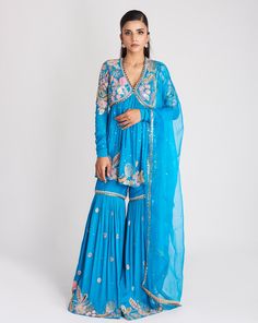 Kinfolk Cyan Blue applique embellished mulberry crepe kurta,gharara with organza dupatta .From Aisha Rao's Kinfolk collection. DELIVERY TIMEPlease allow 6-8 weeks for your outfit to arrive. FABRIC DETAILSCrepe Professional cleaning only. Blue Organza Sharara With Sheer Dupatta, Blue Organza Bollywood Choli, Designer Blue Organza Dupatta, Blue Bollywood Organza Sets, Blue Chiffon Sets With Sheer Dupatta, Cyan Blue, Simple Pakistani Dresses, Change Image, Organza Dupatta