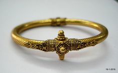 "sterling silver gold vermeil gold gilded Bangle Bracelet from Rajasthan India. great handmade design good for jewelry collection. Note - Please check pictures carefully for more detail. Inner diameter side to side - 5.8 cm(2.28\") Inner circumference - 17 cm (6.7\") width max. - 7 mm weight - 20 grams Material - sterling silver gold plate on top." Bangle Bracelet Gold, Silver Jewelry Earrings, Rajasthan India, Gold Bangle Bracelet, Gold Plated Bracelets, Gold Gilding, Stunning Necklace, Bracelet Gold, Handmade Design