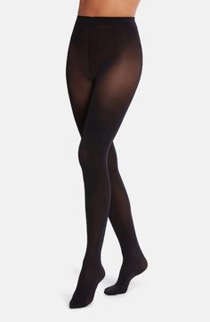 These soft, smooth tights will enhance your legs through a matte, semi-opaque filter that's always in style. Polyamide/elastane Machine wash, line dry Imported Hosiery Elegant Solid Color Elastane Tights, Elegant Full-length Solid Hosiery, Elegant Full Length Solid Legwear, Elegant Micro-elastic Elastane Hosiery, Elegant Compressive Black Legwear, Micro-elastic Soft Touch Elastane Tights, Sleek Solid Tights For Night Out, Sleek Solid Color Tights For Night Out, Sleek Smoothing Elastane Tights