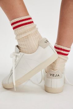 Made with sustainable materials, these retro style leather sneakers are featured in a low-top design with suede details and a tonal logo on the side. * Padded collar and footbed * Lace-up front | Veja Esplar Sneakers at Free People in White, Size: EU 37 White Veja Sneakers, Veja Esplar Sneakers, Veja Esplar, Veja Shoes, Veja Sneakers, Free People Store, Pointed Toe Boots, Amazon Rainforest, Cowboy Boots Women