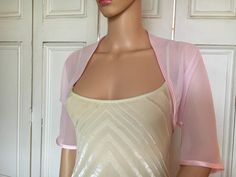 This is a beautiful hand made chiffon shrug ideal for weddings or special occasions. It can also be worn with casual wear. It can be made in any size from 8 to 24 (UK sizes). It is made in the UK. It is normally sent out to you within 5 days, but I am very happy to make your order a priority if you need it urgently. Just let me know the date needed by. Postage is free in the UK! International postage is £9. I am happy to exchange items or refund your payment if you are less than happy with the p Spring Formal Fitted Shrug, Elegant Summer Party Shrug, Elegant Stretch Shrug For Spring, Summer Party Shrug With Stretch, Elegant Fitted Summer Shrug, Stretch Summer Party Shrug, Fitted Shrug For Summer Wedding, Pink Bolero, Summer Wedding Fitted Shrug