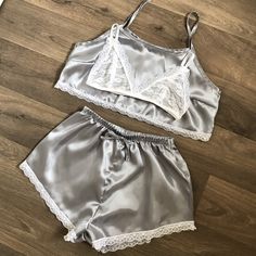 Three piece satin pyjama set with white lace trim. There is an option of crop top & high waisted shorts or normal length top and shorts (if you would like normal length please message me before or after ordering) Please select Pyjama size and then email me your bra size. I make sizes 30-38/A-D Can also come as a two piece with the top and shorts or bralet and shorts. Many other colours are also available, see drop down menu.  Please feel free to message me with any questions. Satin Sets With Lace Trim For Wedding Night, Satin Lace Trim Sets For Wedding Night, Summer Satin Short Sleepwear, Lace Trim Sets For Sleepover In Summer, Summer Sleepover Sets With Lace Trim, Fitted Lace Trim Sets For Pajama Party, Summer Satin Bedtime Sets, Satin Bedtime Sets For Summer, Summer Night Satin Sets