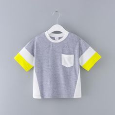 Toddler Boy Color-block T-shirt - PrettyKid Playful Multicolor Color Block T-shirt, Yellow Patchwork T-shirt For Spring, Yellow Patchwork Cotton T-shirt, Yellow Cotton Patchwork T-shirt, Gray Color Block Top For Summer, Gray Color Block Summer Top, Playful Gray Cotton T-shirt, Gray Patchwork Short Sleeve Tops, Gray Color Block T-shirt For Summer