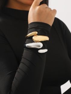 Elevate your wrist game with our statement chunky metal bangle bracelet, a bold and sophisticated accessory that exudes confidence and style. Crafted with meticulous attention to detail, this bracelet is designed to make a lasting impression and add a touch of glamour to any ensemble. Weight: .69g Bold Party Bracelet Jewelry, Chic Metal Cuff Bracelet, Chic Oyster Bracelet For Party, Metal Stretch Bangle Bracelet For Party, Trendy Metal Cuff Bracelet, Modern Chunky Chain Bracelet, Metal Stretch Bangle For Parties, Stretch Metal Bangle For Parties, Chic Metal Bangle Cuff Bracelet