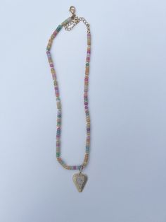 Add a pop of color to your outfit with our Rainbow Necklace Luxe- Easy Does It! This on trend necklace stack features vibrant gemstones, making it a best seller with five stars. Stand out and be the envy of others with this playful and stylish piece. Product Details: 16" lobster claw 2" extender charm not included Trendy Colorful Jewelry With Heart Beads, Rainbow Beaded Chain Necklace Trendy Style, Trendy Rainbow Beaded Chain Necklace, Trendy Multicolor Jewelry With Natural Stones, Trendy Crystal Necklace With Beaded Chain, Multicolor Heart Beads Pendant Necklace, Trendy Multicolor Charm Necklace With Lobster Clasp, Trendy Multicolor Beaded Chain Necklace, Trendy Rainbow Necklace With Heart Beads