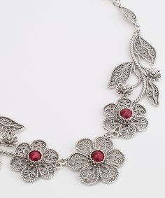 Handmade Ruby Silver Statement Necklace, Sterling Silver Opaque Ruby Artisan Filigree Floral Necklace, Valentine Jewelry Gift Boxed for Her Necklace Length: 19.5 inches, adjustable down to 16 inches Gemstone dimension: Genuine 6 mm approximately 1 carat each, 3 carat total, round faceted checker board This will come in a designer pouch, put in gift box and a romance card. It is a gift that will create memories for years to come. For this particular necklace if desired We may be able to change th Traditional Red Filigree Jewelry, Festive Red Artisan Jewelry, Festive Artisan Red Jewelry, Red Intricate Design Jewelry For Gift, Red Necklaces With Intricate Design For Celebration, Bohemian Ruby Jewelry Gift, Red Bohemian Jewelry With Intricate Design, Red Handmade Jewelry For Wedding, Red Artisan Jewelry For Wedding