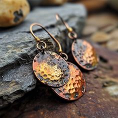 Hear the whispers of Celtic tradition in our handcrafted copper knot earrings, symbolizing timeless connections and intricate beauty. Nature-inspired Copper Dangle Earrings, Artisan Nickel-free Rust-colored Jewelry, Artisan Rust-colored Nickel-free Jewelry, Artisan Rust Color Nickel-free Jewelry, Artisan Hand Forged Earrings, Handmade Copper Artisan Earrings, Handmade Artisan Copper Earrings, Bohemian Brass Earrings In Rust Color, Hand Forged Brown Earrings As A Gift