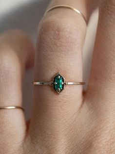 Lucky Green Elixir Ring. This piece will be handmade just for you. Please allow 2-3 weeks of production time before shipping. ✧ 14K Yellow Fine Gold ✧ 4x2mm cultivated green emerald ✧ Pure magic 14k Gold Emerald Cut Birthstone Promise Ring, 14k Gold Emerald Ring For Promise, May Birthstone, 14k Gold Emerald Promise Ring, May Birthstone, Heirloom Emerald Gemstone Ring For Promise, 14k Yellow Gold Emerald Ring For Promise, Heirloom Emerald Ring For Promise May Birthstone, Heirloom Emerald Cut Emerald Ring For Promise, Heirloom Emerald Cut Promise Ring, Dainty Emerald Open Ring Jewelry