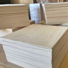 plywood boards stacked on top of each other