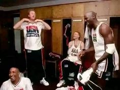 three basketball players are sitting in the locker room and one is holding his hands on his hip