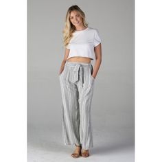 Your Go To Spring/Summer Pants Are Here! These Wide Leg Pants Features An Elastic Waistband In The Back, A Tie Sash In The Front (Or You Can Tie It In The Back), And Pockets! The Way The Black And White Threads Are, Gives The Look Of Gray Stripes. Materials: 100% Rayon Color: Black & White O13 Tie Waist Wide-leg Pants For Summer, Tie Waist Wide-leg Summer Bottoms, Summer Wide-leg Pants With Tie Waist, Summer Wide-leg Bottoms With Tie Waist, White Summer Pants With Tie Waist, White Summer Wide Leg Pants With Elastic Waistband, White Wide-leg Pants With Tie Waist, White Tie Waist High-waisted Pants, White High-waisted Pants With Tie Waist