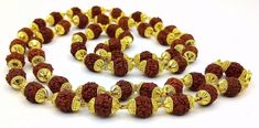 54 beads Rudraksha japp mala for praying to god ,Certified 22kt yellow gold handmade amazing Rudraksha beads chain necklace jewelry from rajasthan india Metal-22 karat yellow gold . Brand-Traditional-jewellery. Length-25 inches. Weight-25.00 grams approx. Width-6 to 6.5 mm approx. Marking-916/22k stamp sign /hallmarked Material-Gold/Rudraksha Makes excellent gifting and collectible pieces. if any tax is applicable at buyers country, buyer has to pay all such taxes as per law. For more informatio Gold Hand-strung Mala For Meditation, Gold Temple Necklace With Gemstone Beads For Festivals, Gold Necklaces With 108 Beads For Rituals, Handmade Gold Spiritual Mala, Gold Mala With 108 Beads As Gift, Gold Mala With 108 Beads For Rituals, Gold Mala With 8mm Beads For Meditation, Handmade Gold Mala For Spiritual Use, Gold 108 Beads Mala For Meditation