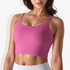 The Anna-Kaci Women's Scoop Neck Stretchy Cropped Sports Bra is a perfect blend of comfort and functionality for your athletic wardrobe. This sports bra features a scoop neckline and a cropped design, providing a modern and stylish look. Made with double-layering and 4-way stretch fabric, it ensures excellent support and flexibility during workouts. The padded cups offer additional comfort and support, making it ideal for various physical activities. Whether you're hitting the gym, going for a r Solid Color Sports Bra With Go-dry Technology, Solid Sports Bra With Light Support For Sports Season, Solid Sports Bra For Yoga, Pink Tank Top With Built-in Bra For Training, Solid Sports Bra For Light Sports, Sports Bra For Light Exercise With Go-dry Technology, Go-dry Sports Bra For Light Exercise, Solid Go-dry Athletic Fit Sports Bra, Pink Workout Tank Top With Light Support