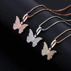 Butterflies are not only beautiful, but also have mystery, symbolism and meaning and are a metaphor representing spiritual rebirth, transformation, change, hope and life. This pendant is created in real .925 Sterling Silver with white prong-set crystals and plated in 3 metal finishes .925 Sterling Silver, gold (vermeil), rose gold (vermeil) Strung on an 16" or 18" Venetian box chain Charm measures 22mm inclusive of bail Spring clasp closure Prong-set stones Clear zircon diamonds Icy Necklace, Evil Eye Ring Silver, Evil Eye Ring Gold, Silver Butterfly Necklace, Gold Leaf Rings, Silver Heart Bracelet, Silver Bling, Butterfly Pendant Necklace, Necklace Chain Lengths