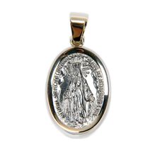 Ideal gift for sacrament gifts Known as a symbol of miracles 14k Gold and Sterling Silver materials will last for generations Our Lady of the Miraculous Medal is one of the most popular devotional medals in the nation. Symbolizing the power of trusting in prayer and known to grant blessings to those who wear it and ask for Our Lady's intercession, the medal's story originated in Paris, France, where 3 apparitions occurred. This is a truly special piece that will surely be precious to whoever rec Symbolic Miraculous Medal Pendant Jewelry, Memorial Miraculous Medal Pendant Jewelry, Miraculous Medal Pendant For Memorial, Spiritual Oval Jewelry For Commemoration, Oval Spiritual Jewelry For Commemoration, Commemorative Gold Jewelry With Large Pendant, Gold Large Pendant Jewelry For Commemoration, Engraved White Gold Jewelry For Commemoration, Memorial Miraculous Medal Medallion Jewelry