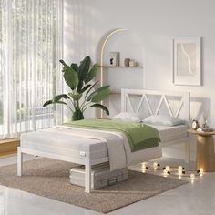 a white bed sitting in a bedroom next to a green blanket on top of a rug